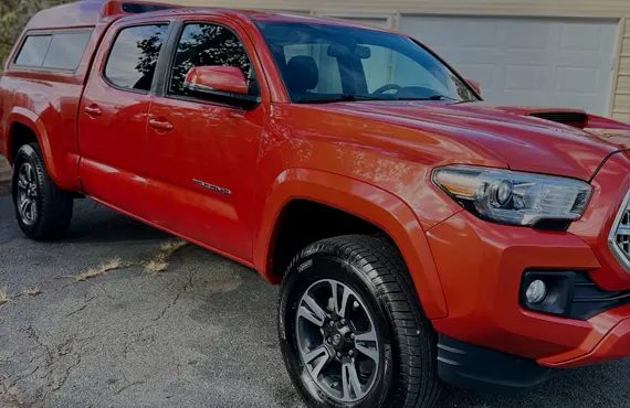 Red pickup after an exterior detail at Virginia Auto Detailing